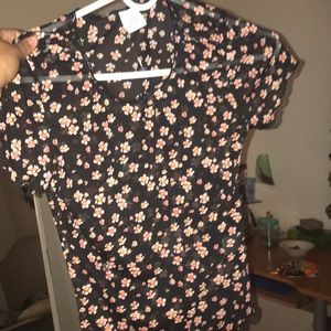 A see through flower shirt from pacsun.